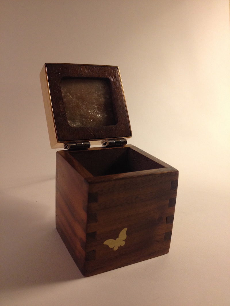 Walnut box with stone and brass inlay open