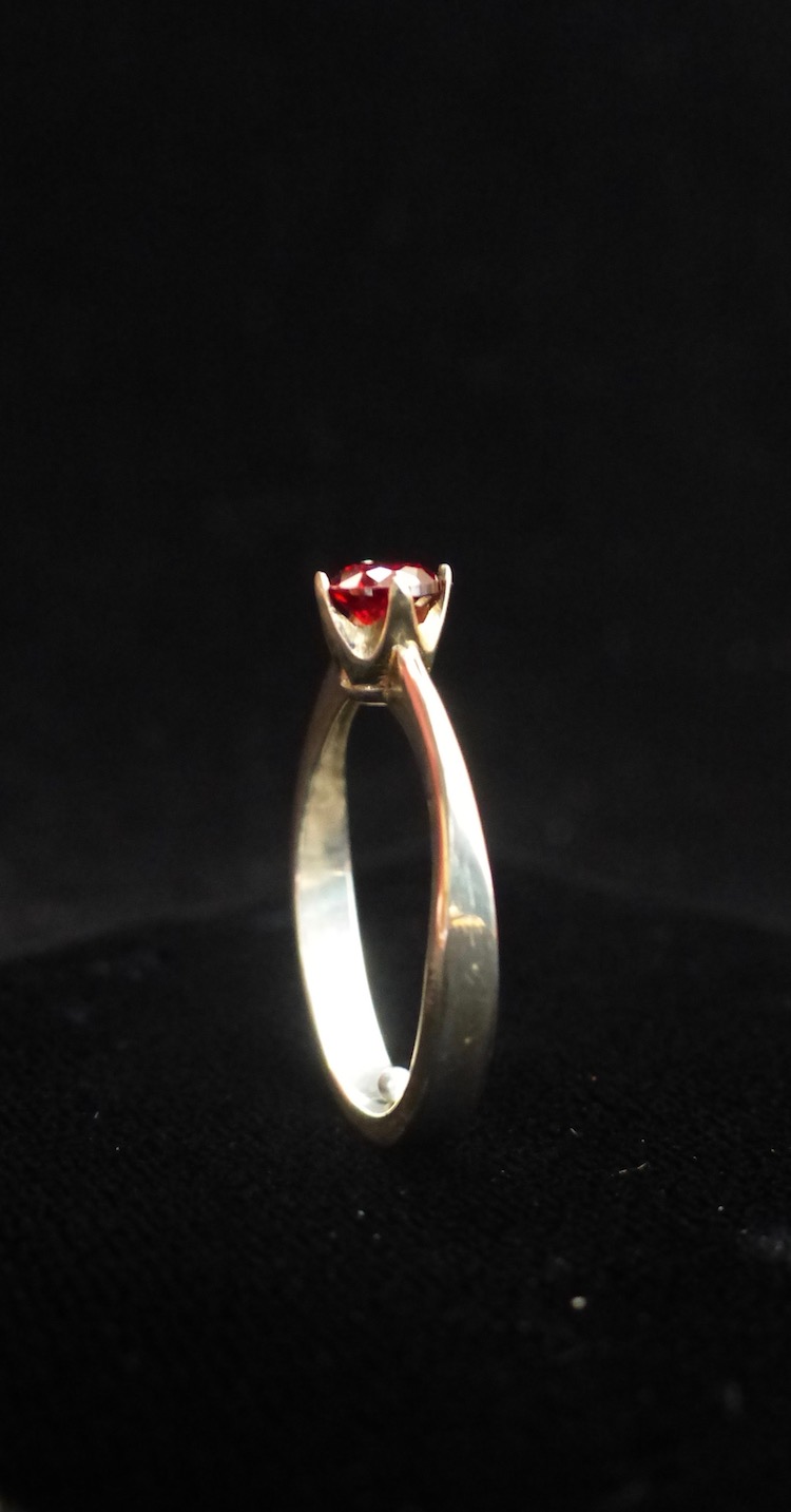 Silver ruby red ring side