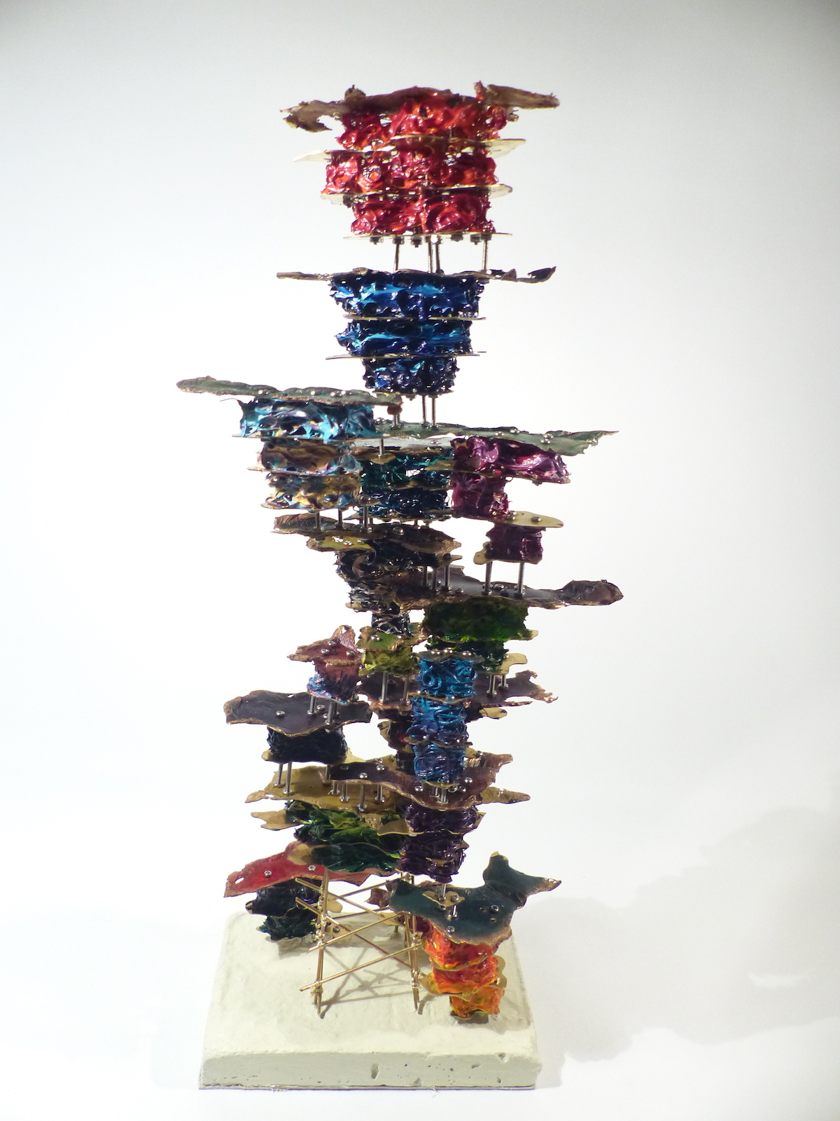 Colourful layers rising to the surface pulling other layers with them