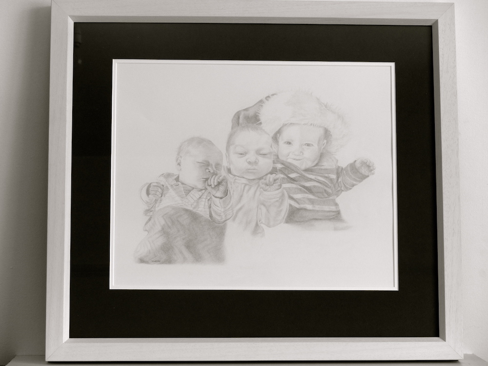 Pencil drawing of Jack waking framed