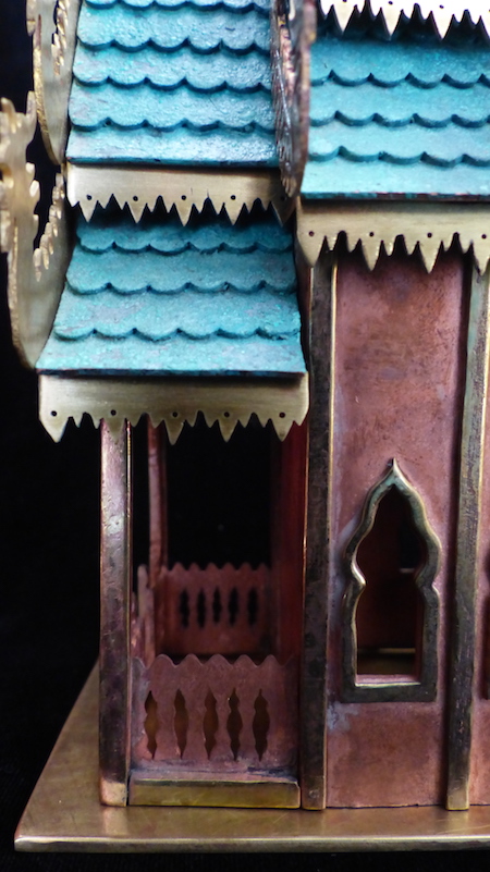 Pink guilded copper,brass and patinated green copper Spirit House porch side close-up