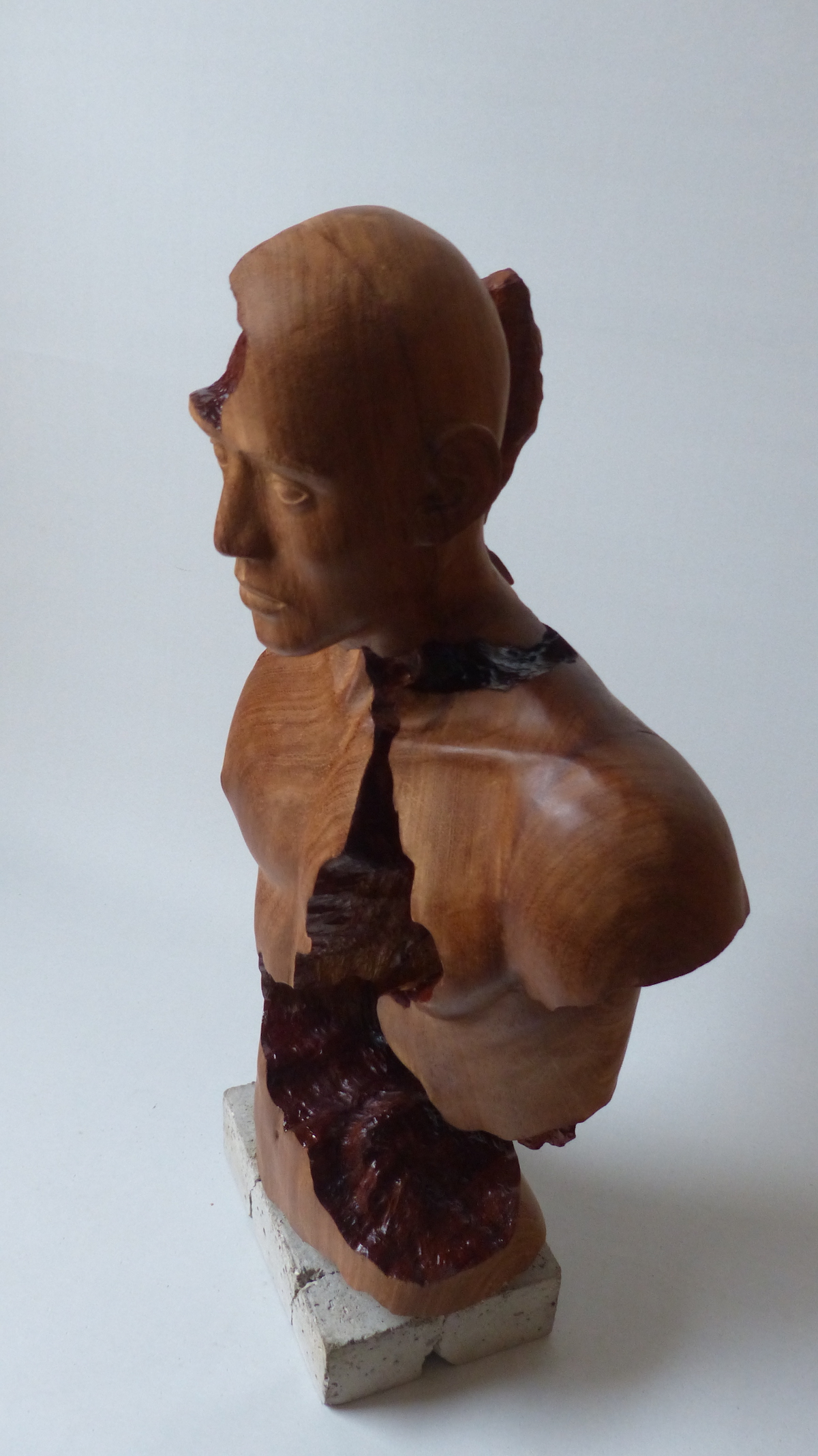 Teak hardwood sculpture of male above left