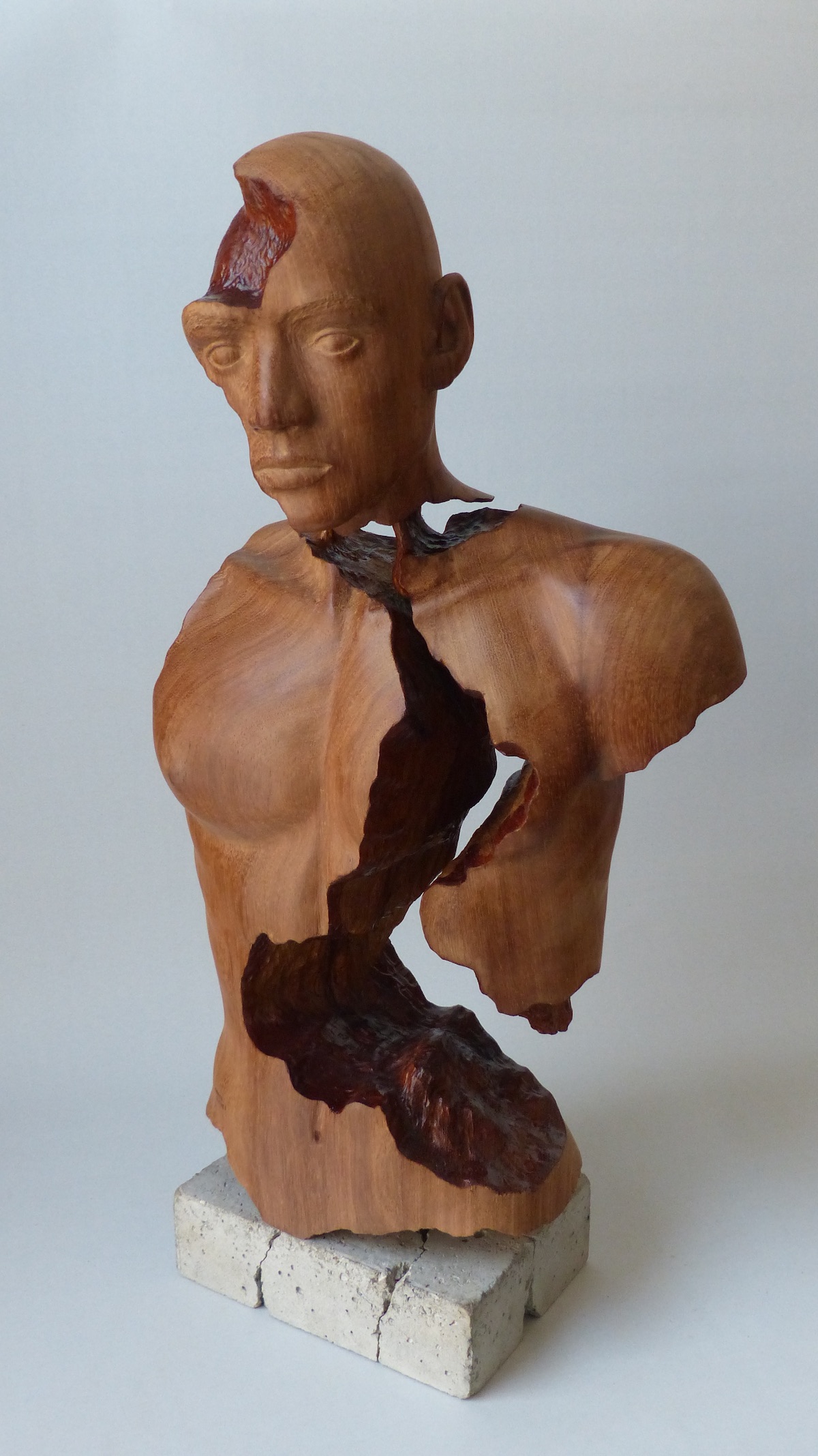 Teak hardwood sculpture of male front left