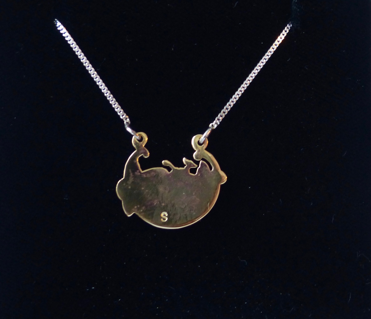 Irish two pence bird in kayak Brass Reverse