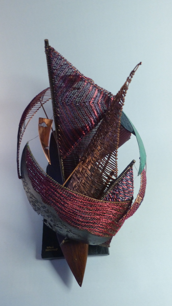 Woven wire sails with Walnut hull